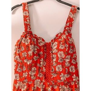 | RED FLORAL JUMPSUIT | NEVER WORN |